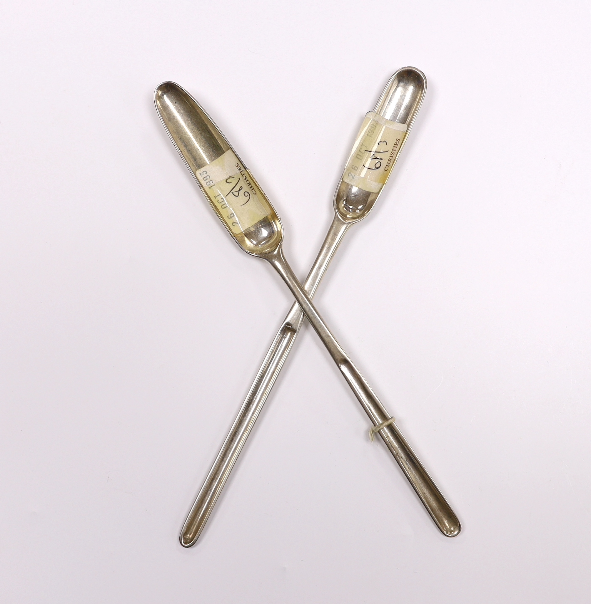 A George II silver marrow scoop, by Jeremiah King, London, 1729 and one other later silver marrow scoop, London, 1787, both approx. 22.7cm, 97 grams.